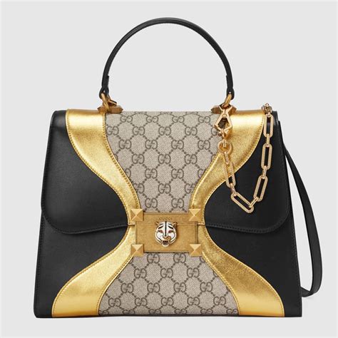 gucci black and gold|black and gold gucci bag.